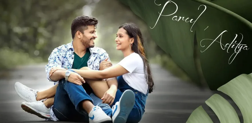 Couple sitting casually together on a pathway for a relaxed pre-wedding shoot