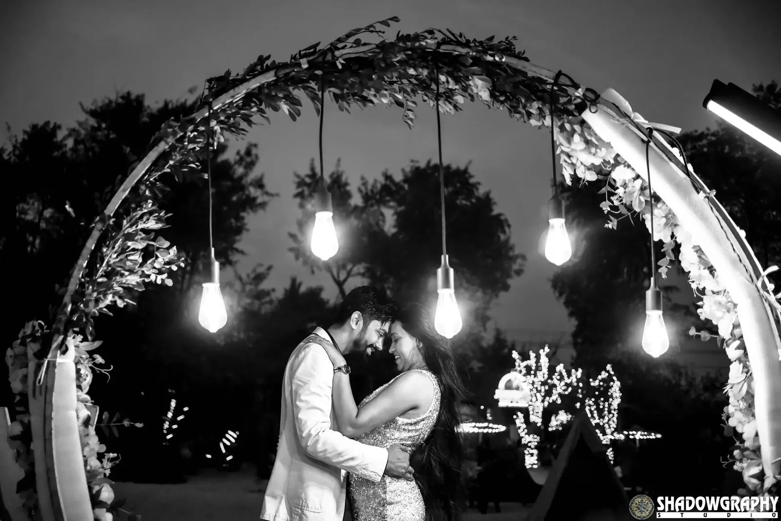 Evening pre-wedding shoot with fairy lights, couple in Indore