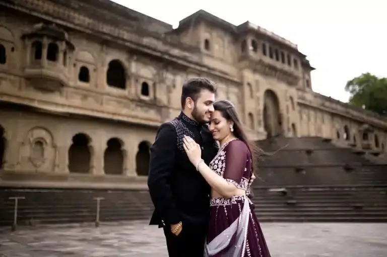 Pre-wedding couple beside palace steps at Maheshwar