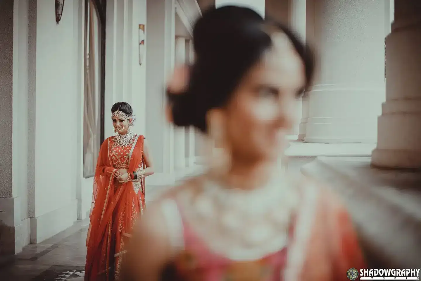 Bride portrait in red lehenga with soft focus, Indore wedding